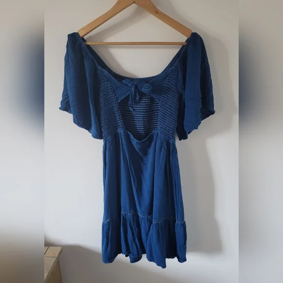 ⭐️ New Listing ⭐️ Natura Shirred Mini Dress with Bow in Blue - Picture 14 of 15